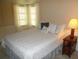 Bedroom with a double bed and nightstand at 5505 Holiday Park Blvd, North Port, FL 34287