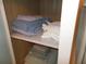 Bathroom linen closet with ample storage shelving at 5505 Holiday Park Blvd, North Port, FL 34287