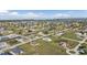 Aerial view of a luxury waterfront community with many new homes and large lots at 17314 Cape Horn Blvd, Punta Gorda, FL 33955