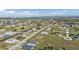 Aerial view of a luxury waterfront community with many new homes and large lots at 17314 Cape Horn Blvd, Punta Gorda, FL 33955