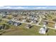 Aerial view of a luxury waterfront community with many new homes and large lots at 17314 Cape Horn Blvd, Punta Gorda, FL 33955