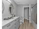 Modern bathroom with double vanity, updated fixtures, and walk-in shower at 17314 Cape Horn Blvd, Punta Gorda, FL 33955