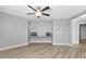 Spacious bedroom with built-in desk and ceiling fan at 17314 Cape Horn Blvd, Punta Gorda, FL 33955
