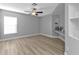 Bright bedroom with large window and ceiling fan at 17314 Cape Horn Blvd, Punta Gorda, FL 33955