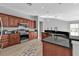 Modern kitchen with dark wood cabinets and granite countertops at 17314 Cape Horn Blvd, Punta Gorda, FL 33955