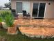 Relaxing patio with terracotta tile and comfortable seating at 17314 Cape Horn Blvd, Punta Gorda, FL 33955