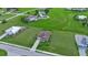 Aerial view of a home nestled on a spacious lot with mature trees at 17314 Cape Horn Blvd, Punta Gorda, FL 33955