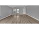 Living room with gray walls and wood-look flooring at 17314 Cape Horn Blvd, Punta Gorda, FL 33955