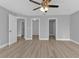 Spacious main bedroom with ceiling fan and multiple entries at 17314 Cape Horn Blvd, Punta Gorda, FL 33955
