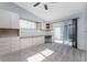 Bright office with built-in cabinetry and patio access at 3300 Loveland Boulevard # 1904, Port Charlotte, FL 33980