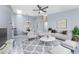 Living room features neutral decor and comfy seating at 3300 Loveland Boulevard # 1904, Port Charlotte, FL 33980