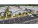Aerial view of a building and parking lot in the community at 3300 Loveland Boulevard # 1904, Port Charlotte, FL 33980