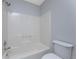 Bathroom with shower/tub combo and toilet at 3300 Loveland Boulevard # 1904, Port Charlotte, FL 33980