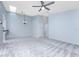 Living room with light walls and carpeted floors at 3300 Loveland Boulevard # 1904, Port Charlotte, FL 33980