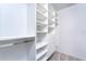 Well-organized closet with hanging rod and shelves at 3300 Loveland Boulevard # 1904, Port Charlotte, FL 33980