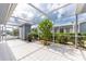 Spacious screened patio with tile flooring and storage shed at 3300 Loveland Boulevard # 1904, Port Charlotte, FL 33980
