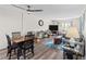 Dining area with wood table and chairs, near living room at 22375 Edgewater Dr # 126, Port Charlotte, FL 33980
