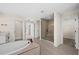 Spa-like bathroom with walk-in shower and freestanding tub at 42548 Little Ridge Rd, Punta Gorda, FL 33982