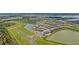 Aerial view of a large community with various amenities at 42548 Little Ridge Rd, Punta Gorda, FL 33982