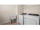 Convenient laundry room with Whirlpool washer and dryer, and utility sink at 42548 Little Ridge Rd, Punta Gorda, FL 33982
