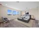 Bright bedroom featuring large windows and plenty of natural light at 42548 Little Ridge Rd, Punta Gorda, FL 33982