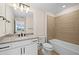 Bathroom featuring a toilet, bathtub, and modern vanity at 42548 Little Ridge Rd, Punta Gorda, FL 33982