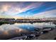 Calm marina with boats and sunset reflection in water at 5123 Melbourne St # D104, Port Charlotte, FL 33980