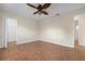 Well-lit bedroom with tile flooring and large closet at 5149 Latham Ter, Port Charlotte, FL 33981