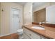 Bathroom with granite countertop and tile flooring at 5149 Latham Ter, Port Charlotte, FL 33981