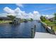 Private dock on a tranquil canal; perfect for boating and enjoying waterfront living at 5149 Latham Ter, Port Charlotte, FL 33981