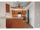 Spacious kitchen with granite countertops and stainless steel refrigerator at 5149 Latham Ter, Port Charlotte, FL 33981