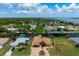 Single-Gathering home on a canal with a large lot and tropical landscaping at 5149 Latham Ter, Port Charlotte, FL 33981