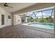 Spacious pool and patio area with screened enclosure at 5149 Latham Ter, Port Charlotte, FL 33981