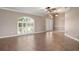 Living room with tile floors and access to front yard at 5149 Latham Ter, Port Charlotte, FL 33981