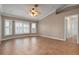 Spacious living room with tile floors and a ceiling fan at 5149 Latham Ter, Port Charlotte, FL 33981