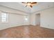 Large bedroom with tile flooring and a ceiling fan at 5149 Latham Ter, Port Charlotte, FL 33981
