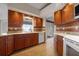 Well-equipped kitchen with ample counter space and wood cabinets at 5149 Latham Ter, Port Charlotte, FL 33981