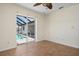 Bedroom with pool access and sliding glass doors at 5149 Latham Ter, Port Charlotte, FL 33981