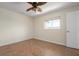 Bright bedroom featuring tile floors and a window at 5149 Latham Ter, Port Charlotte, FL 33981