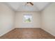 Bedroom with tile flooring and large window at 5149 Latham Ter, Port Charlotte, FL 33981