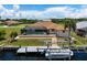Private screened pool and patio area, with canal-front access at 5149 Latham Ter, Port Charlotte, FL 33981