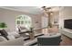 Spacious living room featuring a neutral color palette and plenty of natural light at 5149 Latham Ter, Port Charlotte, FL 33981