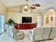 Comfortable living area with built-in entertainment center at 530 Kensington St, Port Charlotte, FL 33954