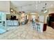 Open floor plan with kitchen, living, and dining areas at 530 Kensington St, Port Charlotte, FL 33954