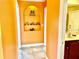 Bright hallway with decorative alcove and tiled floor at 530 Kensington St, Port Charlotte, FL 33954