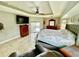 Bright main bedroom featuring a king bed and access to the pool at 530 Kensington St, Port Charlotte, FL 33954
