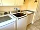 Modern laundry room with Samsung washer and dryer at 530 Kensington St, Port Charlotte, FL 33954