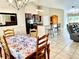 Spacious dining area with a view into the kitchen at 530 Kensington St, Port Charlotte, FL 33954