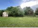 Backyard featuring a storage shed at 1405 Dorchester St, Port Charlotte, FL 33952