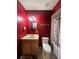 A bathroom featuring a wooden vanity, medicine cabinet, and shower/tub combo at 1405 Dorchester St, Port Charlotte, FL 33952